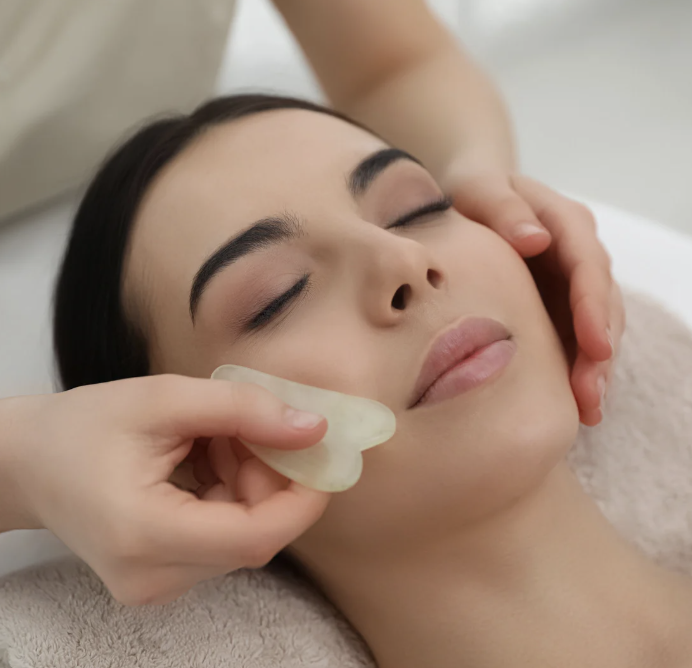 Guasha Facial Gua Sha facial therapy for lymphatic drainage and facial contouring at Beauty Salon Singapore